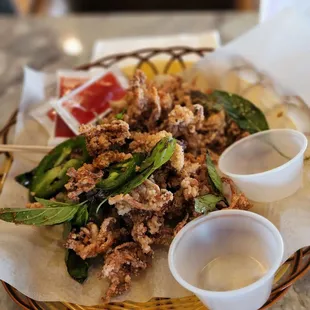 a basket of fried squids