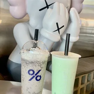 Okinawa Oreo smash with boba , and honeydew smoothie with crystal boba .