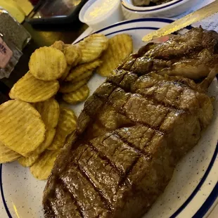 Ribeye with buffalo chips and sautéed mushrooms