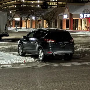 Mainly empty parking lot, Saturday evening 9pm.