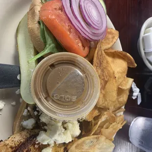 Mediterranean Chicken Sandwich w/balsamic dressing with a side of homemade chips.