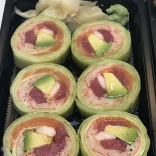 a tray of sushi rolls