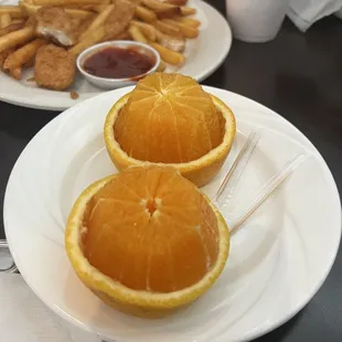 Kids chicken nuggets &amp; Cut up oranges for kid dessert