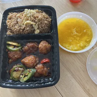 General&apos;s chicken with fried rice and Egg drop soup, lunch portion.