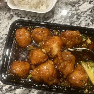 Descustin flooded with sauce and cheap ass frozen chicken not authentic or good even a little