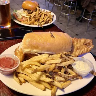 Enormous fresh fish and a blue cheeseburger with bacon