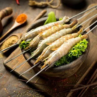 bunch of shrimp on skewers