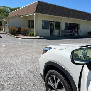 a car parked in front of a building