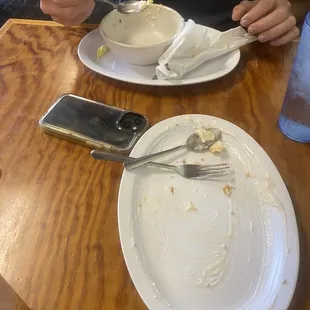 The remains of our biscuits and gravy and breakfast bowl! Delicious!