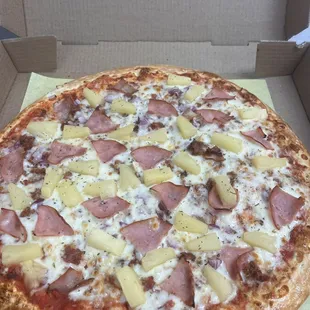 Hawain pizza with ham and pineapple.