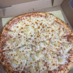 Cheese with pineapple pizza.