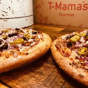 Alamo pizza. Non-vegan &amp; vegan versions, hard to tell by looking at them or trying them, both are awesome!