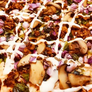 Zodiac Class pizza. Vegan Libra's perfect balance of veggies, vegan meat and sauce.