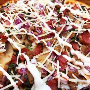 Zodiac Class pizza. Libra's perfect balance of veggies, meat and sauce.