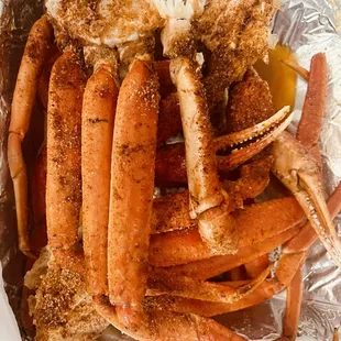a tray of crab legs and legs