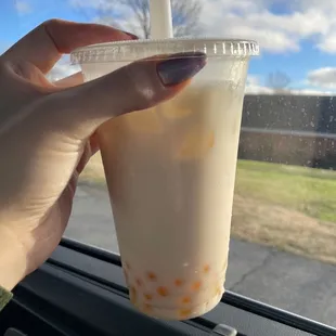 Coconut milk tea with passion fruit boba