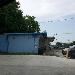 If you give this guy a dollar he&apos;ll play a tune for you on his guitar right next door