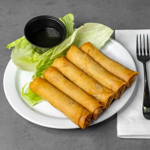 A. House crispy pork egg rolls