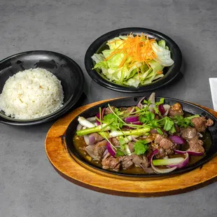 44. Sautéed diced beef filet mignon (served with steamed rice and house salad)
