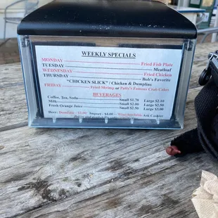 a menu on a wooden table