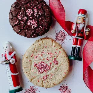 a chocolate cookie, a nutcracker, and a candy cane