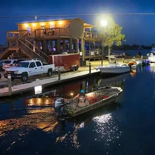 a boat docked at night