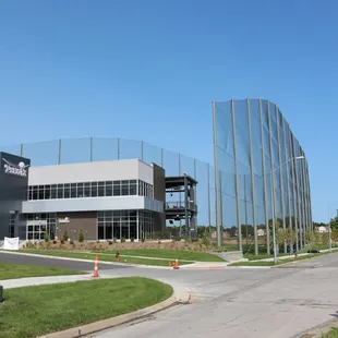 the outside of a building with glass walls
