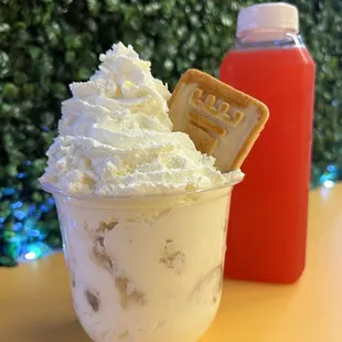 a cup of ice cream and a cookie