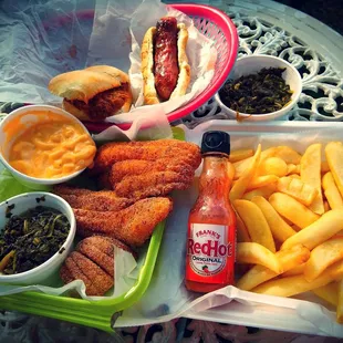 Mac, Greens, Fries, Catfish Fillets, Bratwurst n Pulled Pork Sandwich everything outstanding Delicious