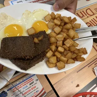 2 eggs over easy, fried Liver Pudding, Hash Browns