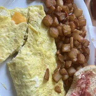 Cheese omelette, add mushrooms, and home fries with a biscuit