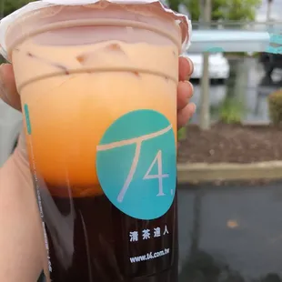 My Thai iced milk tea before I shook it.