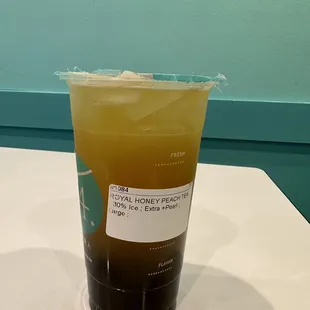 a drink in a plastic cup