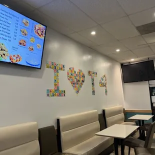 a restaurant with tables and chairs