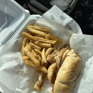 Leftover fries and chicken bacon Philly sandwich special