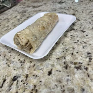 Carne asada burrito 1/2 pound just meat and very goos flavor tortilla