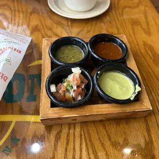 The salsas that came with chips.