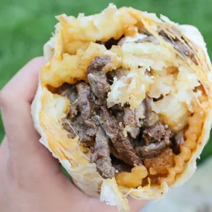 California Burrito:  Flour tortilla, crinkle fries, choice of meat, cream and cheese.