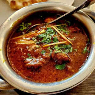 Goat Curry. $19.99. Came with side of Rice.