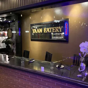 Seating with great views of the Denton Courthouse on the square.