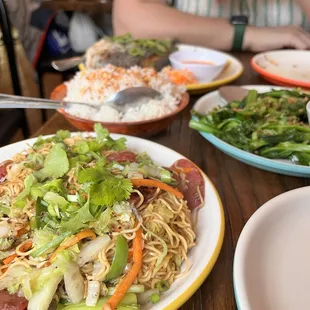 Garlic rice, pancit, pea shoots