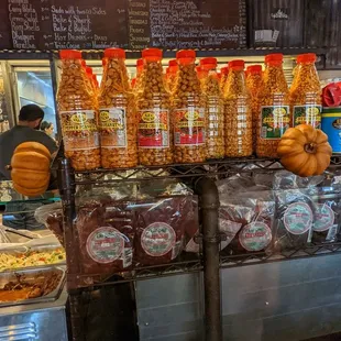 Authentic Trini snacks. Red mango, red plum, fried and spicy nuts and channa