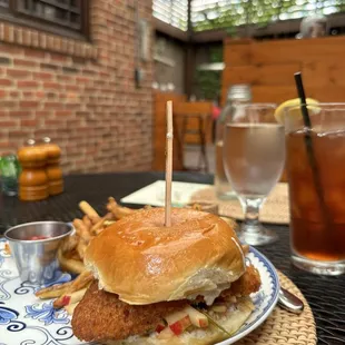 Fried chicken sandwich with za'atar buttermilk and apple slaw with perfectly cooked herb fries