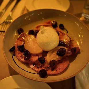 Burrata with fresh tomatoes and olives