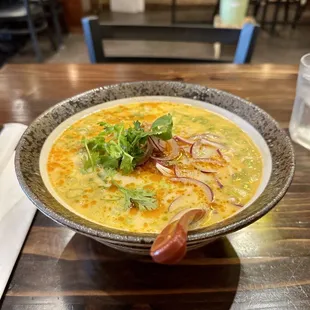 Tan Tan Men Ramen - spicy chicken and sesame ramen, served with cilantro and red onions