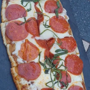 Pepperoni flatbread minus the jalapenos because it was for my kid