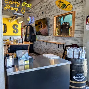 a counter with a beer keg