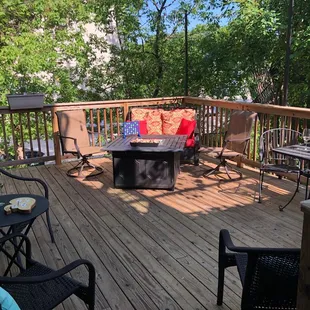 Upper deck/patio with fire pit, plenty of seating and even heaters and blankets for chilly nights.
