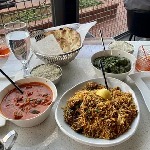 Chicken tika masala, lamb biryani, and palak lamb