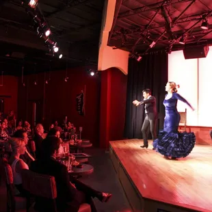 Premium seating available in front of the stage.